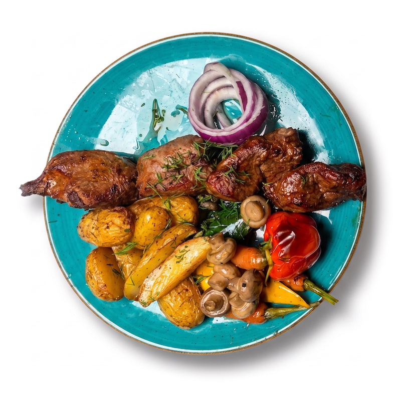 Mzwadi — lamb skewer with potatoes and vegetables